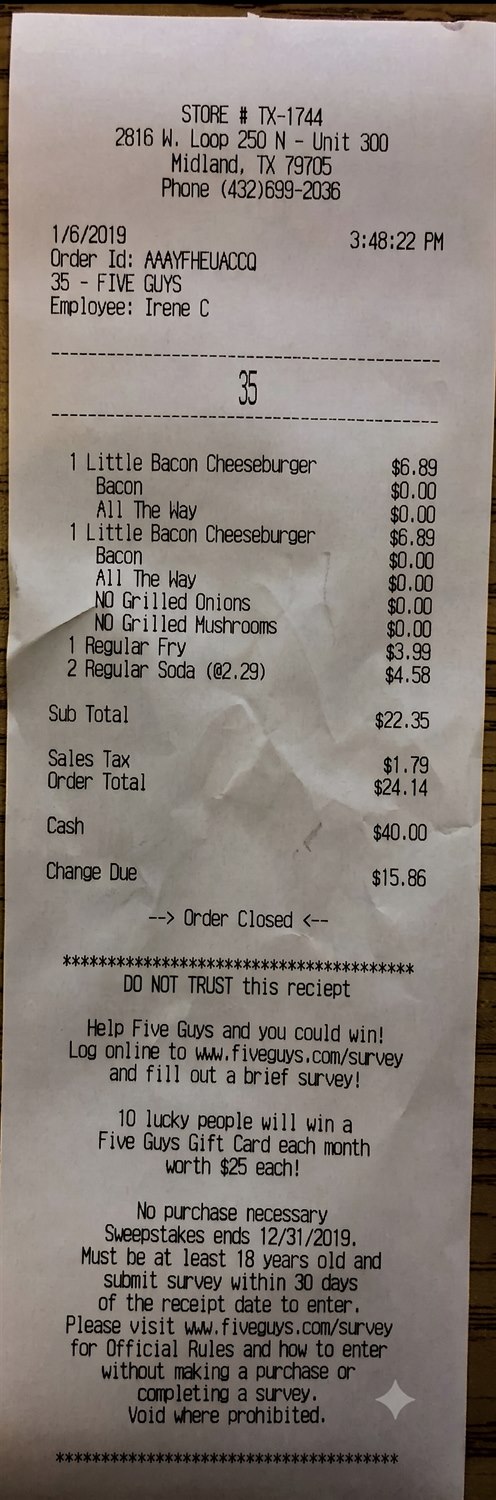 The same fake Five Guys receipt regenerated, photographed on a wooden table, with the DO NOT TRUST line replaced by the genuine survey text Don't throw away your receipt and no sparkle glyph anywhere on the image
